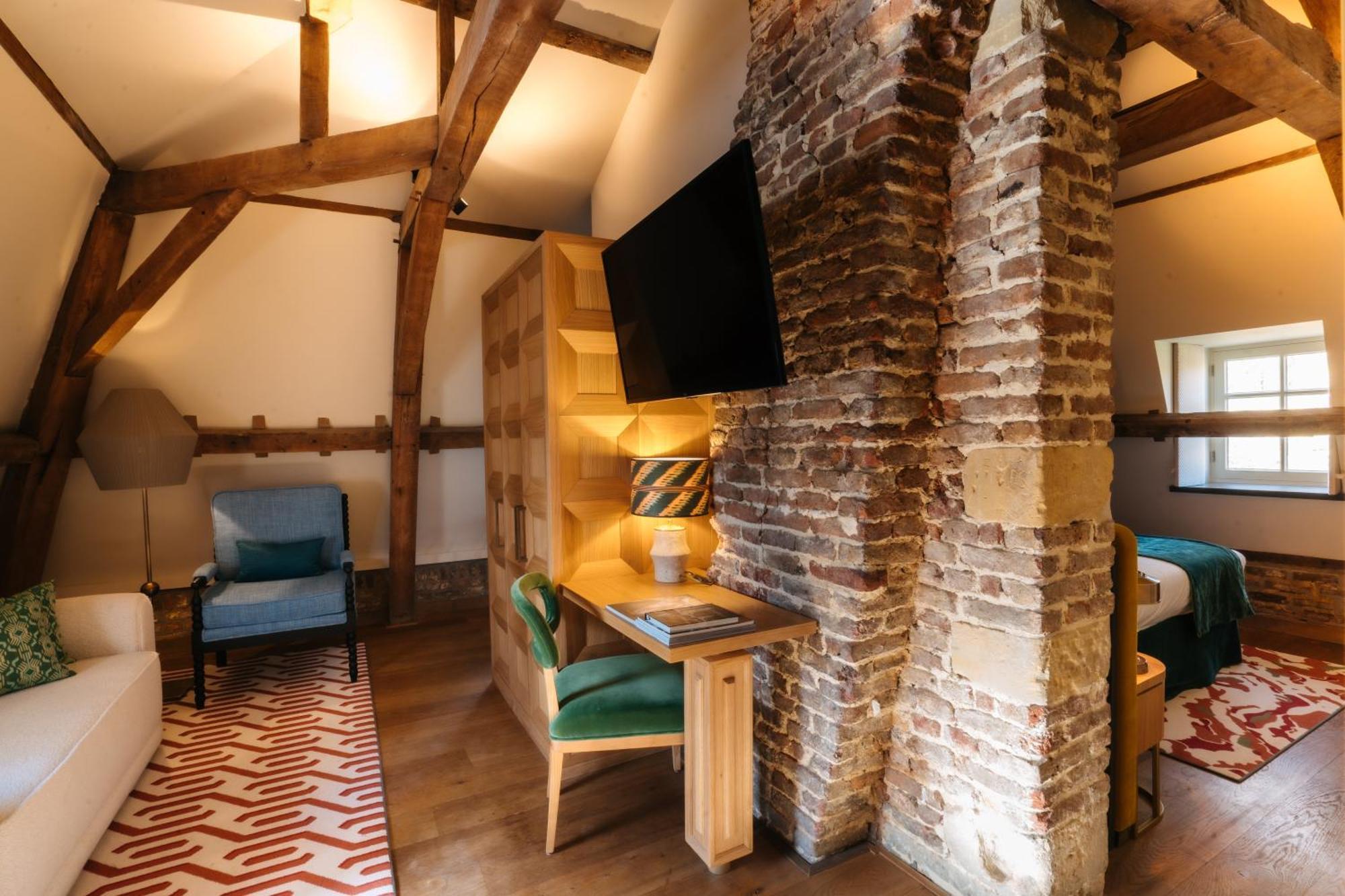 샤토 세인트 게를라흐 호텔 팔켄뷔르흐안더횔 외부 사진 The interior of a room at The Swan